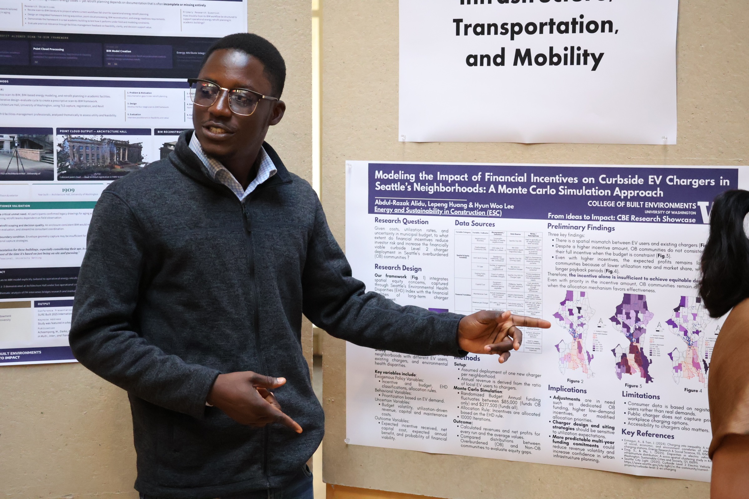 Person pointing at graphic on poster