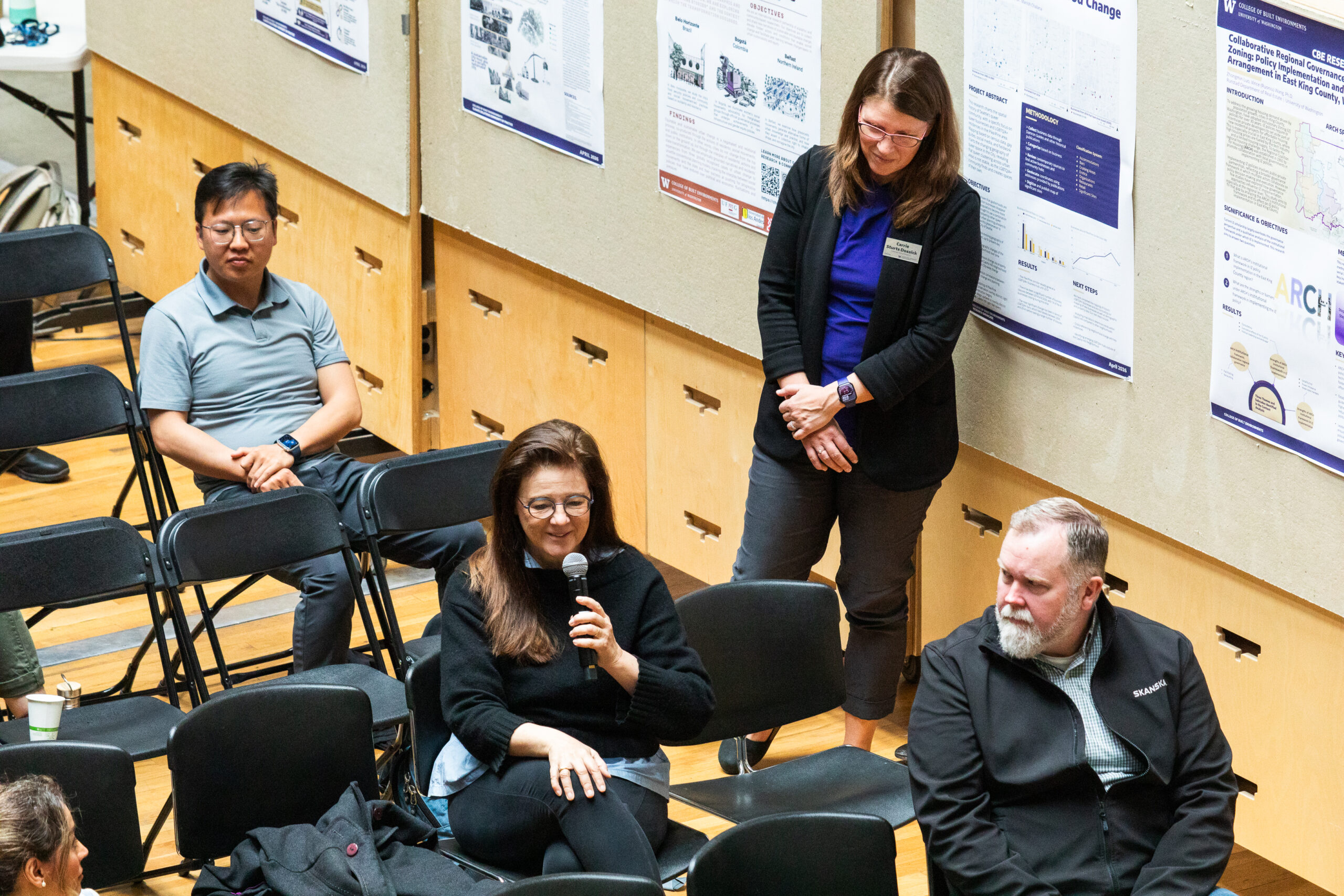 Sarah Jones asking a question at the symposium